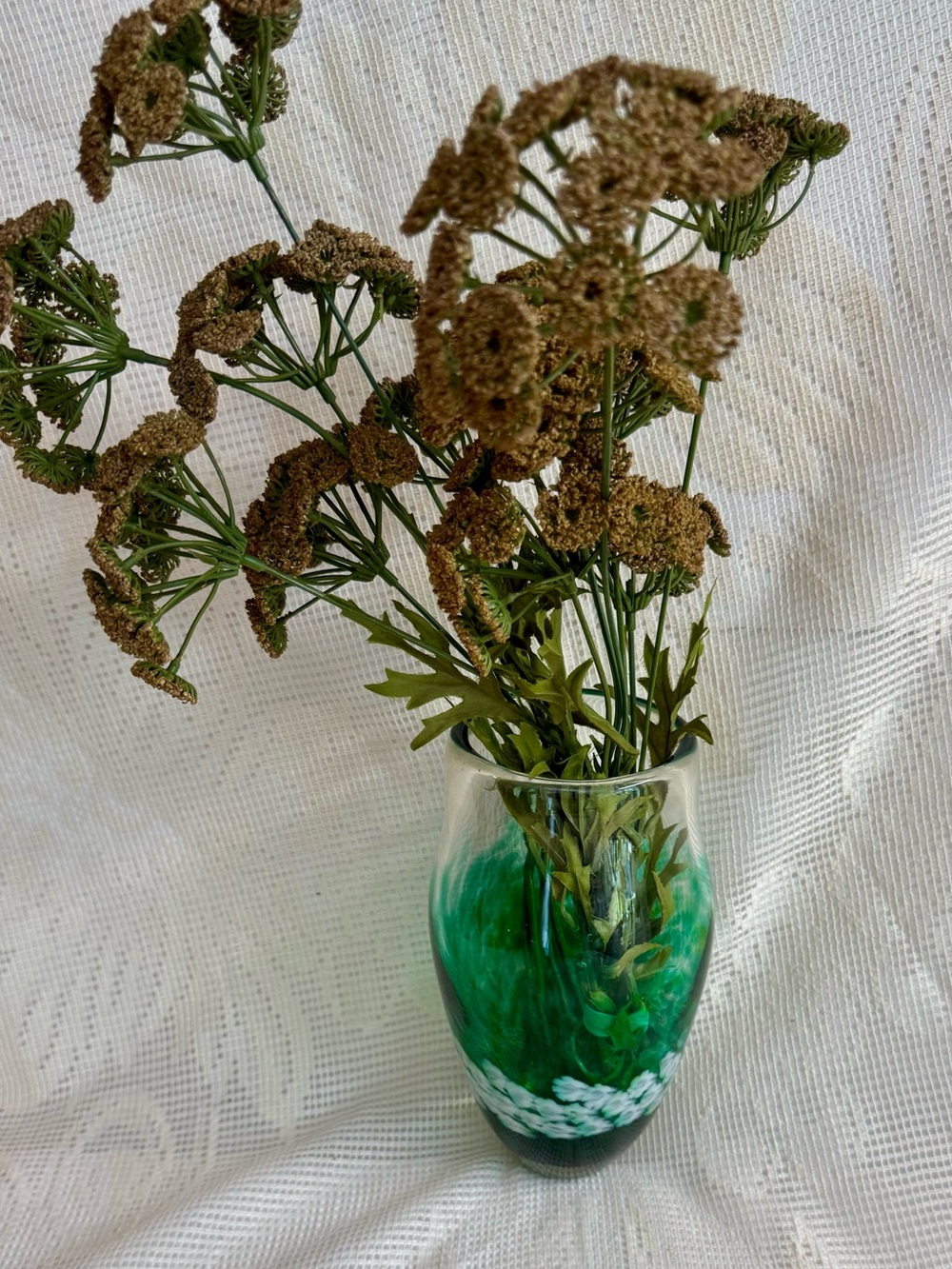 Hand Blown + Signed.Green Swirl Glass Vase with White Flowers.